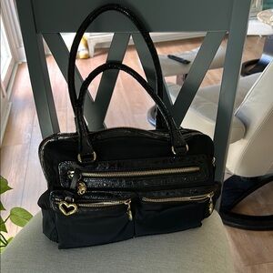 Elegant Black Handbag with Gold Accents